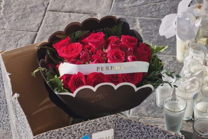 Un ramo de flores con la palabra 