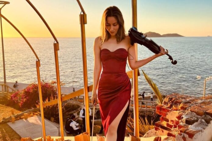 ¿Quién es Esmeralda Camacho, la violinista que se viralizó tras concierto de Christian Nodal?