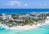 Semarnat avala nuevo hotel en Costa Mujeres y proyecta más crecimiento turístico Vista aérea de la zona continental de Isla Mujeres, donde Semarnat autorizó la construcción del hotel Majestic Playa Mujeres.