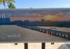 Puente Nichupté recorrerá México y el mundo con una estampilla postal conmemorativa Estampilla conmemorativa del Puente Nichupté emitida por Correos de México con imagen panorámica de la vialidad en Cancún.